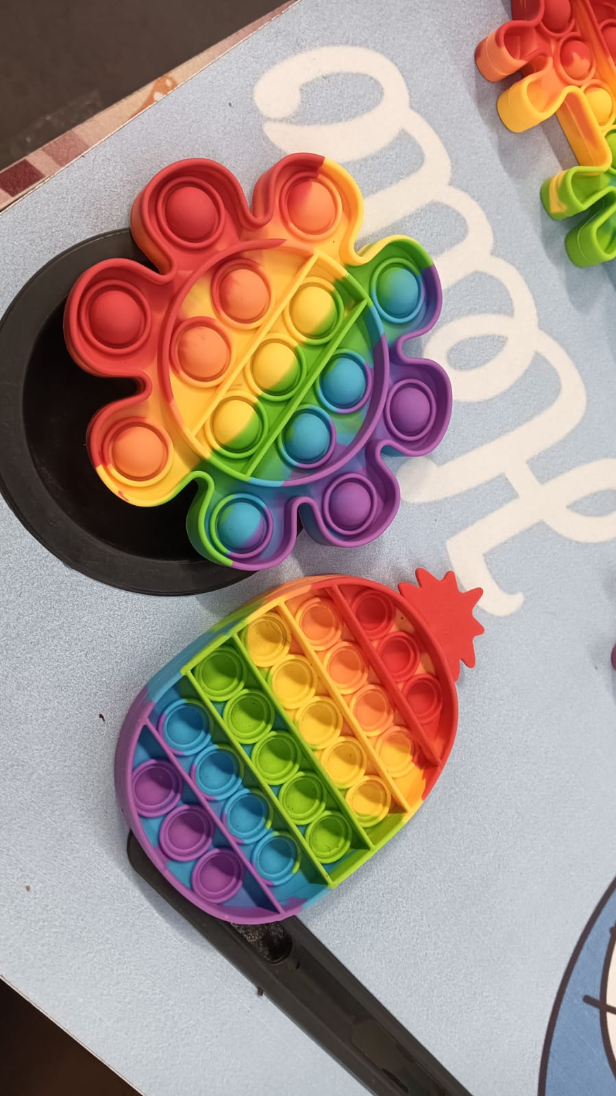 Colorful sensory toy with multiple push bubbles for stress relief