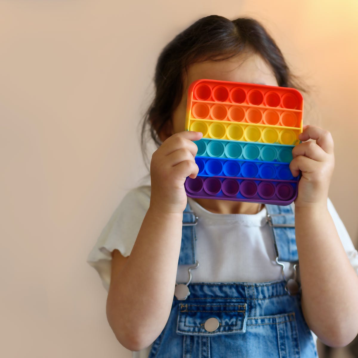 Rainbow bubble fidget toy designed for sensory play