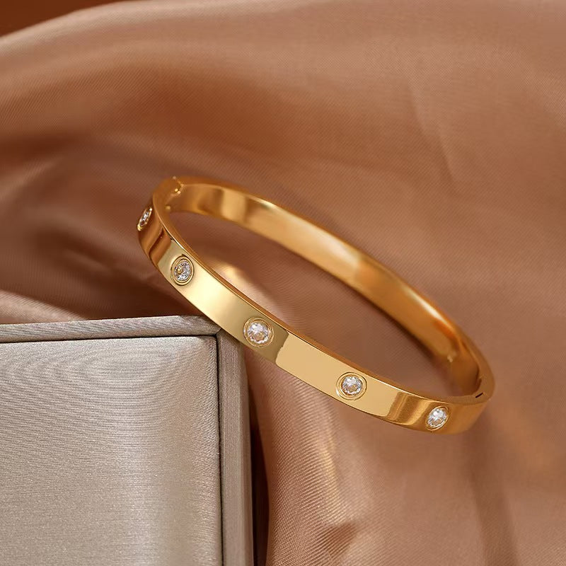 Gold Crystal Bracelet – Sleek Modern Design with Embedded Gemstones