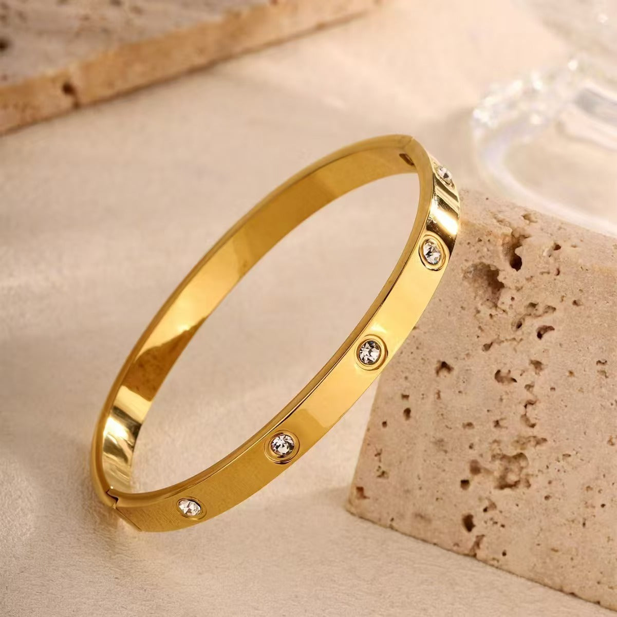Gold Crystal Bracelet – Sleek Modern Design with Embedded Gemstones