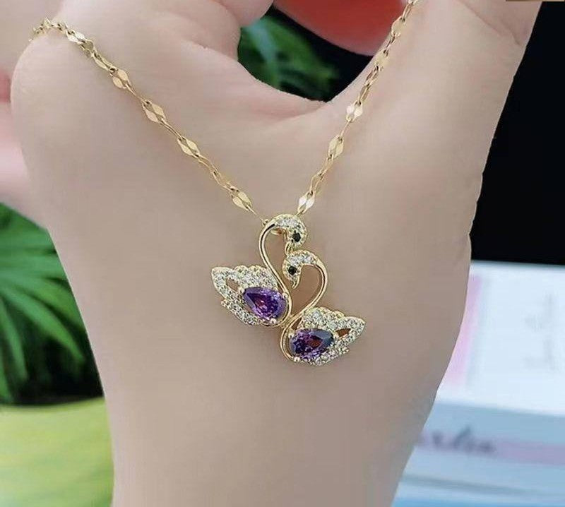 Gold Swan Pendant Necklace – Purple Gemstone & Crystal Detailing