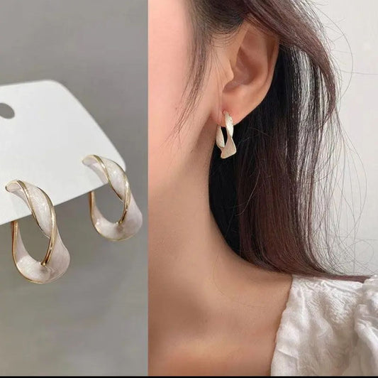 Pearlescent White & Gold Twisted Hoop Earrings – Luxurious Statement Jewelry
