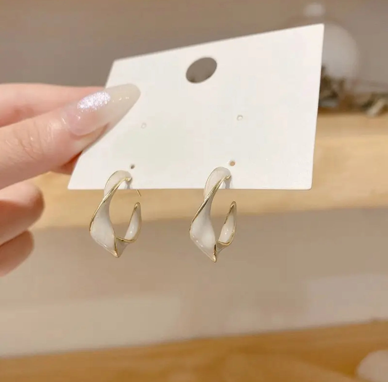 Pearlescent White & Gold Twisted Hoop Earrings – Luxurious Statement Jewelry